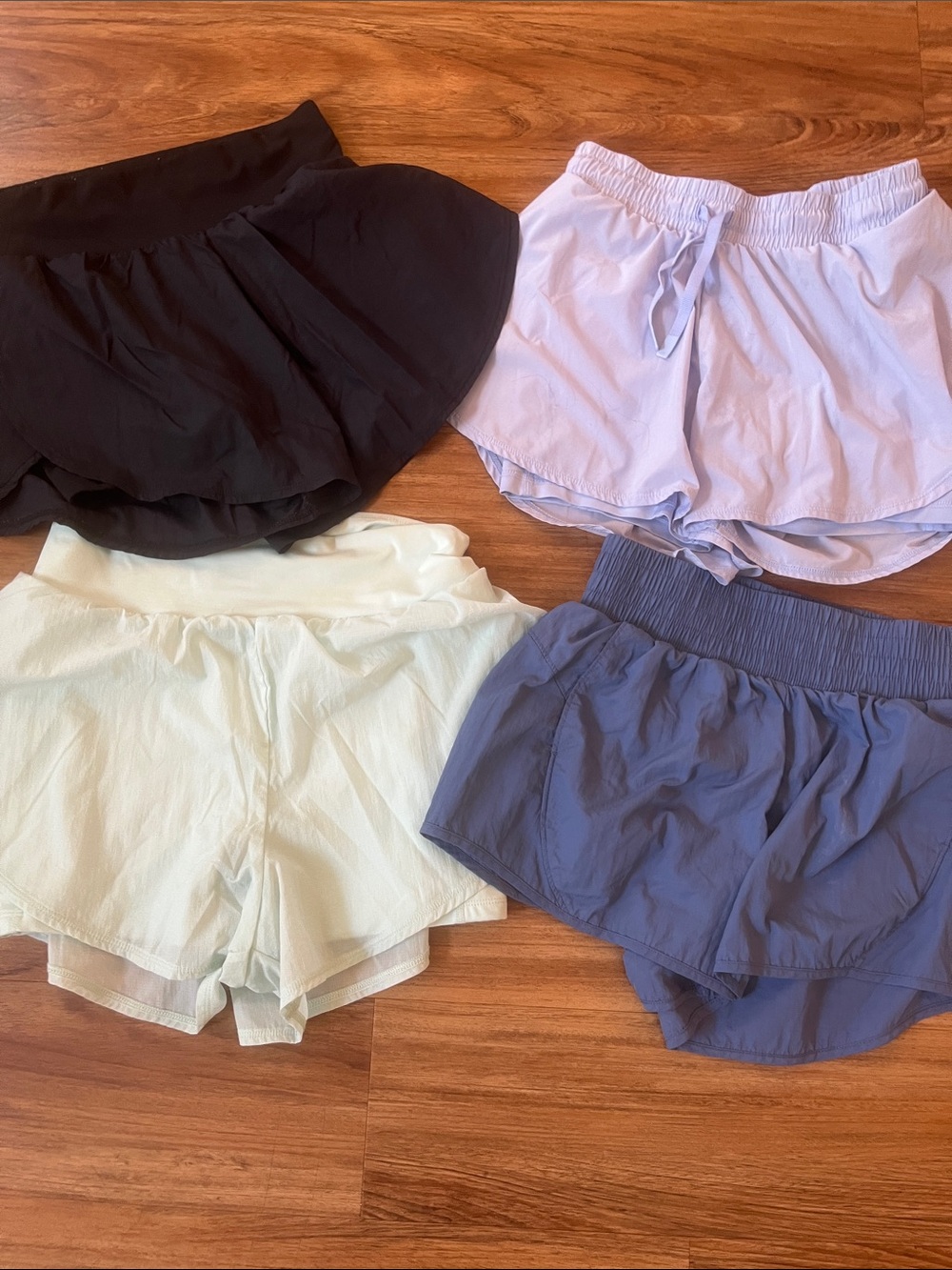 All In Motion Set of 4 Athletic Shorts - Black, Light Purple, Mint, Slate Blue